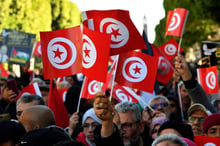 Des centaines de Tunisiens ont manifesté le 14 janvier 2024 à Tunis à l’occasion du 13e anniversaire de la révolution de 2011. © FETHI BELAID / AFP