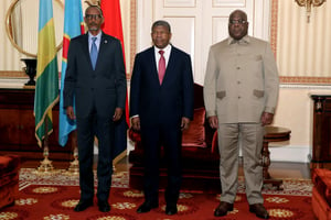 Paul Kagame, Joao Lourenço et Félix Tshisekedi réunis à Luanda. © Jorge NSIMBA / AFP