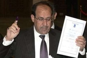 Les résultats partiels portant sur 30% des bulletins placent la liste d’al-Maliki en tête. © Reuters