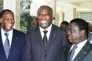 Alassane Ouattara, Laurent Gbagbo et Henri Konan Bédié, le 22 janvier 2002. © AFP