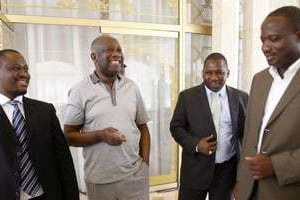 Le président Laurent Gbagbo, entouré de Guillaume Soro (à g.) et de Désiré Tagro (à d.). © Luc Gnago/Reuters