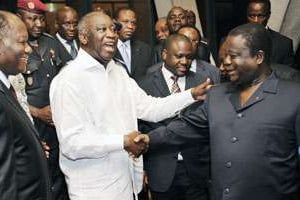 De g. à d. : Alassane Ouattara, Laurent Gbagbo, Guillaume Soro et Henri Konan Bédié, le 30 juin. © AFP