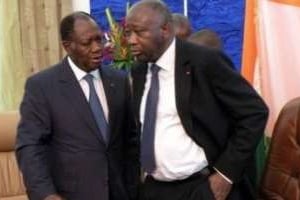 Laurent Gbagbo et Alassane Ouattara, le 21 septembre 2010 à Ouagadougou. © AFP