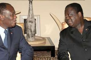 Les deux leaders du RHDP, Alassane Dramane Ouattara et Henri Konan Bédié, en juillet 2008. © AFP
