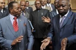 Bingu wa Mutharika avec Laurent Gbagbo, le 25 janvier à Abidjan. © AFP