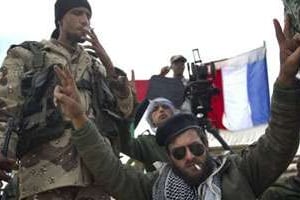 Des rebelles libyens le 15 avril 2011 à Ajdabiya. © AFP