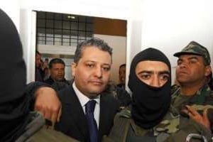 Imed Trabelsi arrive au tribunal, à Tunis, le 20 avril 2011. © AFP