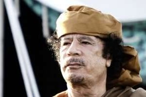 Kaddafi allume son portable, 45 minutes plus tard la maison de son hôte est bombardée. © Joseph Eid / AFP