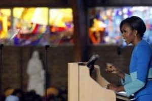 Michelle Obama, le 22 juin 2011 à l’église Regina Mundi, à Soweto. © AFP