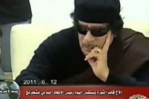 Mouammar Kaddafi apparaît à la télévision officielle syrienne, le 13 juin 2011. © AFP