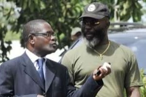 Simplice Kouadio Koffi (à gauche) et Fofié Kouakou, geôlier de Gbagbo à Korhogo. © AFP