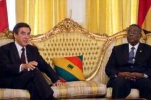 François Fillon et le président ghanéen John Atta Mills, le 16 juillet 2011 à Accra. © AFP