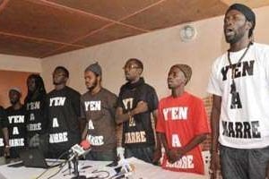 Les rappeurs du groupe « Y’en a marre », lors d’une conférence de presse le 27 juin 2011 à Dakar. © AFP