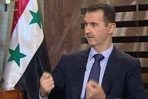 Dimanche soir, le président syrien Bachar el-Assad interviewé par la télévision d’Etat. © AFP