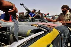 Des combattants pro-CNT à Wadi Mardum, à 30 km de Bani Walid, le 3 septembre 2011. © AFP