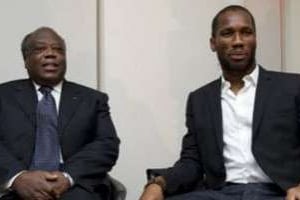Charles Konan Banny et Didier Drogba à Londres le 20 septembre 2011. © AFP