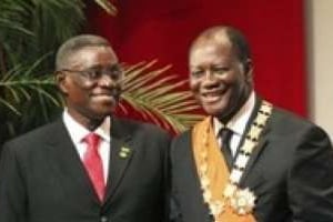 Atta-Mills et Ouattara, lors de la cérémonie d’investiture de ce dernier, en mai 2011. © D.R