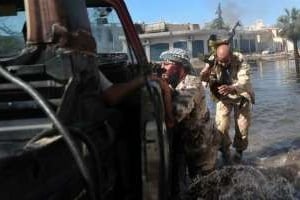 Des combattants du CNT le 13 octobre à Syrte. © Aris Messinis/AFP