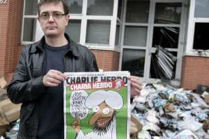 Les musulmans de France condamnent l’incendie des locaux de l’hebdomadaire Charlie Hebdo. © Alexandre Klein/AFP
