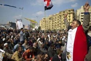 Des manifestants sur la place Tahrir au Caire le 2 décembre 2011. © AFP
