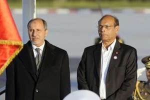 Le président tunisien M. Marzouki (d) et le chef du CNT libyen M. A. Jalil à Tripoli. © AFP