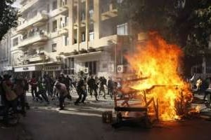 Affrontements entre policiers et des manifestants, le 18 février 2012 à Dakar. © AFP