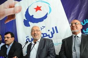 De g. à dr. : A. Larayedh, R.Ghannouchi et H. Jebali. © AFP