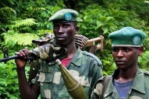 Des rebelles congolais du M23 dans les collines du Nord-Kivu le 3 juin. © Melanie Gouby/AFP