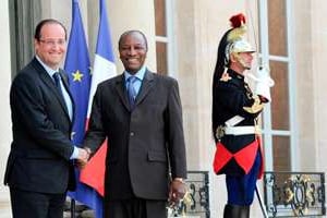 François Hollande et Alpha Condé, le 2 juillet à l’Elysée. © Mehdi Fedouach/AFP IMAGEFORUM