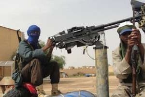 Des combattants du groupe islamiste du Mujao, près de Gao, dans le nord du Mali, le 7 août 2012. © AFP
