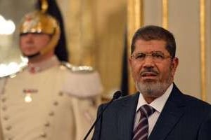 Le président égyptien Mohamed Morsi parle lors d’une conférence de presse, le 14 septembre 2012. © AFP