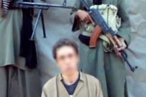 Capture d’écran d’une vidéo de l’un des otages français détenu par Aqmi. © AFP