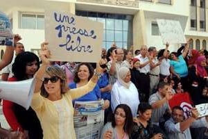 Des journalistes de Dar Essabah en grève, le 11 septembre 2012. © AFP