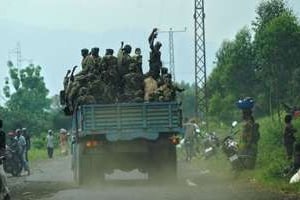 Des rebelles du M23 dans le camp de réfugiés de Mugunga, le 24 novembre. © AFP