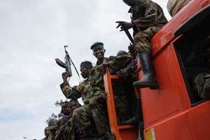 Des combattants du M23 célèbrent leur victoire dans les rues de Goma, le 20 novembre. © Phil Moore/AFP
