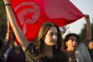 Une jeune manifestante en octobre 2011 à Tunis. © AFP