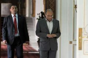 Le président tunisien Moncef Marzouki arrive à ses bureaux, le 19 février 2013 à Tunis. © Fethi Belaid/AFP