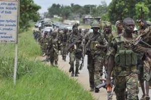 On estime qu’entre 50 000 et 100 000 combattants opèrent encore en Côte d’Ivoire. © AFP