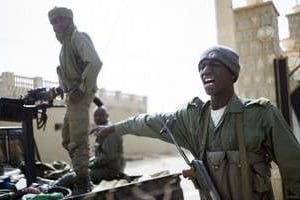Des soldats maliens à Tombouctou, le 1er février 2013. © AFP