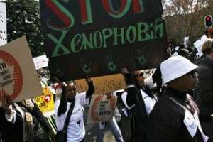 Une manifestation contre les agressions xénophobes, à Yeoville, en 2010. © AFP
