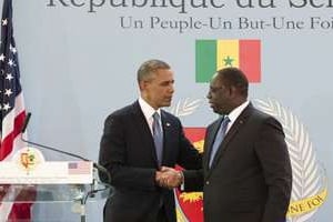 Barack Obama (à g.) et Macky Sall, à Dakar le 27 juin. © AFP