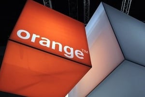 Lancé dans 13 pays d’Afrique et du Moyen-Orient, Orange Money compte désormais plus de 7 millions de clients. © AFP