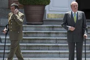 Le roi d’Espagne (à dr.), Juan Carlos, à Madrid le 11 juin 2013. © AFP