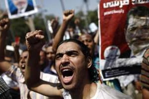 Des partisans de Mohamed Morsi, le 5 juillet 2013 au Caire. © AFP