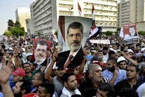 Une manifestation de partisans de Mohamed Morsi, le 5 juillet, au Caire. © AFP