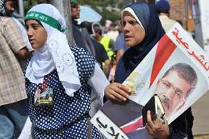 Des partisans de Mohamed Morsi, le 26 juillet 2013 au Caire. © AFP