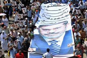 Les partisans de l’ex-président islamiste Mohamed Morsi défilent au Caire, le 2 août 2013. © AFP