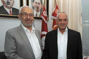 Le chef du parti tunisien Ennahdha (g), et le secrétaire général de l’UGTT, le 12 août 2013 à T © AFP