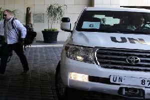Des inspecteurs de l’ONU à Damas, le 18 août 2013. © AFP