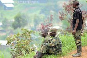 Des miliciens de l’APCLS à Nyabiondo, dans le nord de la RDC, juillet 2013. © AFP